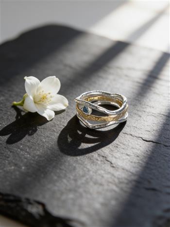 Silver And Gold Wave Ring With Topaz - thumbnail 0